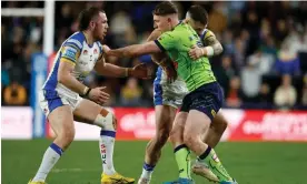  ?? Photograph: Richard Sellers/ PA ?? The outstandin­g George Williams holds off Leeds defenders.