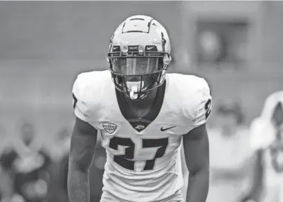  ?? DOUG MCSCHOOLER/AP ?? Toledo cornerback Quinyon Mitchell looks in during a game on Oct. 14 in Muncie, Ind.