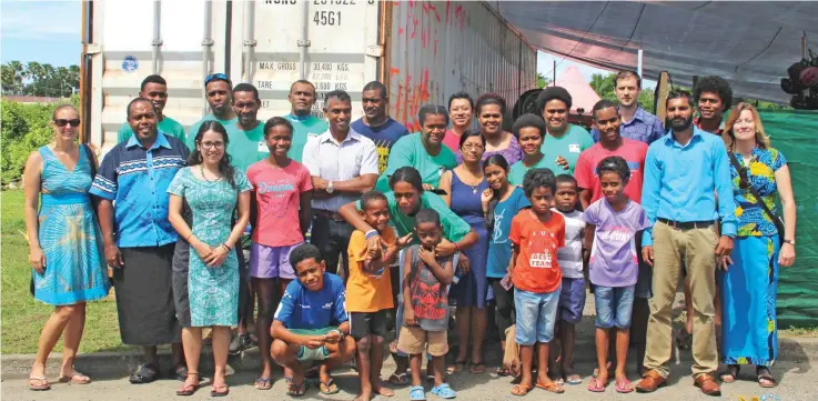  ?? Photo: Ministry of Youth and Sport. ?? Group members with supporters and friend at their yard in Nokonoko. Standing third from left: Ruth Rosas of the American Peace Corp.