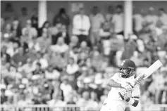  ??  ?? India’s captain Virat Kohli plays a shot during the first day of the third Test cricket match between England and India at Trent Bridge in Nottingham, central England on August 18, 2018. - AFP photo