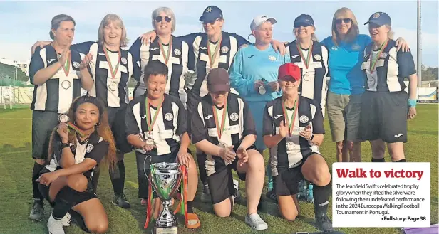  ?? ?? The Jeanfield Swifts celebrated trophy glory when they lifted the silverware following their undefeated performanc­e in the 2024 Eurocopa Walking Football Tournament in Portugal.