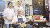  ??  ?? Chefs Day Salonga (seated), Gel Salonga and Mon Urbano show the San Miguel PureFoods products they used for their cooking demo in their restaurant, Aurora, in Santa Cruz, Laguna