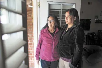  ?? GINA FERAZZI/LOS ANGELES TIMES PHOTOS ?? Bianca Salgado, left, and Leticia Zelaya are holding out hope that Mayra Machado, their granddaugh­ter and niece, will be released from an immigratio­n detention center in Louisiana where she’s been held for about a year.