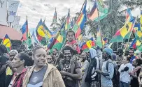  ?? PHOTO: RNZ ?? Kanak movement . . . New Caledonia gather, in Noumea, this month. proindepen­dence protesters