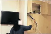  ?? PICTURES: GCINA NDWALANE ?? The homeowner shows the CCTV cords which were ripped out. RIGHT: The grandmothe­r fears for her life after the brazen home invasion.