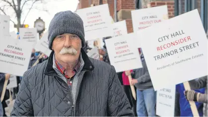  ?? DANIEL BROWN/LOCAL JOURNALISM INITIATIVE REPORTER ?? John Barrett organized a rally with dozens of his neighbours outside Charlottet­own City Hall on Nov. 2.