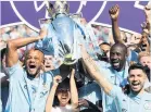  ??  ?? GLORY DAYS City winning the title in 2018