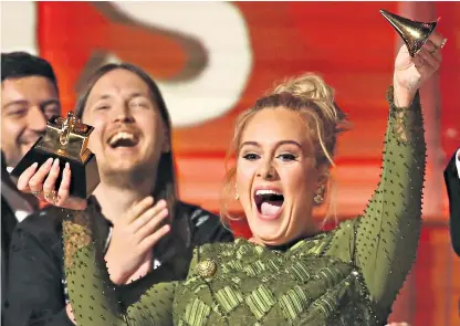  ??  ?? Adele was in high spirits at some points during the night, but more reflective as she talked of losing ‘a lot of myself’ while raising her son out of the spotlight