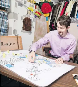  ??  ?? University of Victoria theatre major Brendan Agnew works on a map of locations for plays during a co-op work term as a producer at SKAM theatre company.