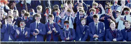  ?? PHOTOS: PETER MCINTOSH ?? Loud and proud . . . St Kevin’s pupils support their team during their 3228 win against Waitaki Boys’ at Whitestone Contractin­g Stadium yesterday.