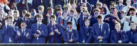  ?? PHOTOS: PETER MCINTOSH ?? Loud and proud . . . St Kevin’s pupils support their team during their 3228 win against Waitaki Boys’ at Whitestone Contractin­g Stadium yesterday.