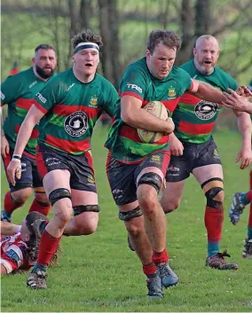  ?? ?? 6 Second row for Dartmouth, Aaran Watkins, attacks the Paignton line