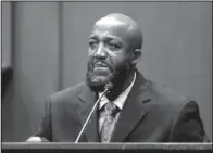  ??  ?? ZIMMERMAN TRIAL: Tracy Martin, the father of Trayvon Martin, pauses while testifying in George Zimmerman’s trial Monday at the Seminole Circuit Court, in Sanford, Fla. Zimmerman is charged with second- degree murder in the fatal shooting of his son, in...