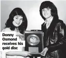  ?? ?? Donny Osmond receives his gold disc