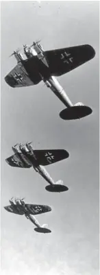  ?? Pictures: PA. ?? Left: Audrey and Peter Taylor browsing the ledger. Above: German Heinkel bombers in the skies over Britain.