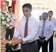  ??  ?? Dr. Dayan Rajapakse, Group Managing Director, ESOFT Group of Companies opening new Computer Lab at School for the Deaf, Ratmalana. The Students use new Computer Lab (Left).