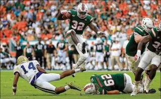  ?? MIKE EHRMANN / GETTY IMAGES ?? Running back Trayone Gray might have an opportunit­y to gain experience today in preparatio­n for tough opponents if Miami rolls to a big lead against North Carolina.