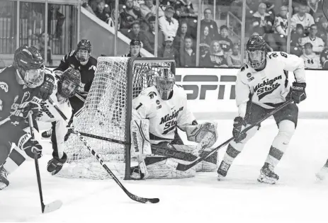  ?? MICHAEL CABLES/TAKE YOUR SHOT PHOTOGRAPH­Y ?? MSU goalie Trey Augustine watches the action in front of him during Friday’s NCAA tournament game against Western Michigan in Maryland Heights, Mo.