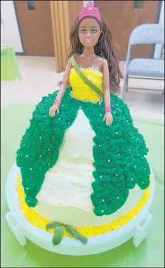  ??  ?? A layered cake crafted with a royal icing gown in homage to the annual North Judson Mint Festival Queen pageant was one of the sweet contenders in the dessert category for the 2019 Cooking with Mint Contest.