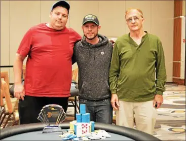  ?? PHOTO PROVIDED ?? Shaun Deeb, left, won the Capital Region Classic trophy, as well as $ 36,559in winnings for securing the top spot in the five- day, no limit Texas Hold’em tournament. Michael Lynch, center, of Staten Island took second and Keith Pierce was third.