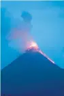  ??  ?? The volcano west of Guatemala City exploded on Sunday, sending clouds of ash miles into the air.