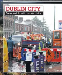  ??  ?? DUBLIN CITY Crews work to switch on electricit­y