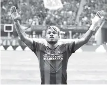  ?? AP PHOTO/CURTIS COMPTON ?? Atlanta United’s Josef Martinez celebrates a goal against the Philadelph­ia Union during a June 2018 match in Atlanta. Martinez has signed a five-year contract extension with Atlanta United, ending speculatio­n the league MVP might be heading back to Europe after a record season.