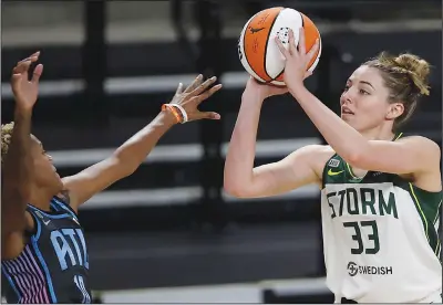  ?? (File Photo/AP/Ben Margot) ?? Seattle Storm forward Katie Lou Samuelson shoots against the Atlanta Dream on June 11 during the first half of their WNBA basketball game in College Park, Ga. Samuelson is out of 3-on-3 basketball at the Olympics after contractin­g covid-19 while training in Las Vegas.