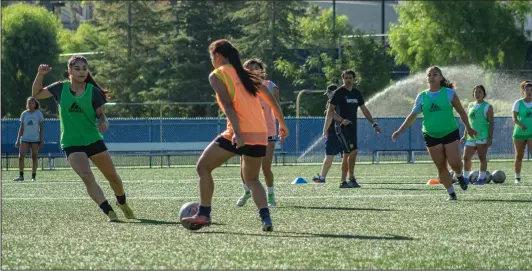  ?? Bobby Block/The Signal (See additional photos on signalscv.com) ?? (Above) COC women’s soccer players Lesly Cabrera and Gracell Magnaye, practice at College of the Canyons on Thursday. (Below) COC soccer player Emily Perez practices on the field. The Cougars have their first scrimmage against the Central California Aztecs on Thursday, Aug. 22.