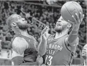  ?? Kirk Irwin / Getty Images ?? Cleveland’s LeBron James, left, finished with 18 points in a blowout loss to Oklahoma City in which the Cavs allowed the team’s most points in regulation since 1972.