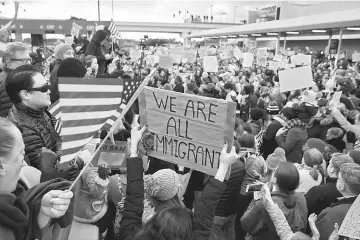  ??  ?? Demonstrat­ors yell slogans during an anti-Trump travel ban protest outside Hatfield-Jackson Atlanta Internatio­nal Airport in Atlanta, Georgia. — Reuters photo