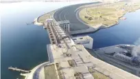  ??  ?? This still image taken from drone footage posted online shows smoke rising near the Tabqa Dam, in Raqqa, Syria. US-backed forces in northern Syria paused military operations near a major dam held by the Islamic State group in order to allow engineers...