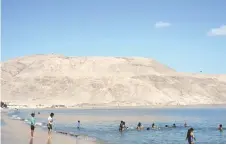  ?? ?? People enjoy the beach in Mejillones, Antofagast­a Region, Chile.