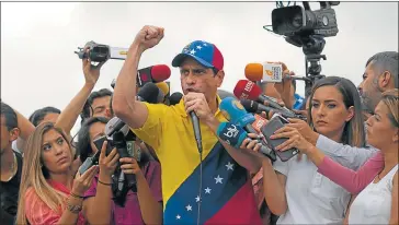  ?? AP ?? EN PROTESTA. Henrique Capriles, líder opositor, fue uno de los promotores de la huelga general.