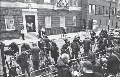  ??  ?? Members of the media take their positions outside the Lindo wing at St Mary’s hospital in central London on May 2 after the announceme­nt was made by Kensington Palace that Catherine, Duchess of Cambridge, Prince William’s wife, was admitted to hospital...