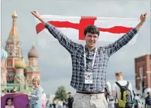  ?? CHRISTOPHE­R FURLONG GETTY IMAGES ?? England fan Peter Rogers poses for a picture in Red Square ahead of the World Cup semifinal game between England and Croatia in Moscow.