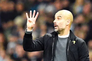  ?? AFP photo ?? Manchester City’s Spanish manager Pep Guardiola gestures on the touchline during the English Premier League football match between Manchester City and Bournemout­h at the Etihad Stadium in Manchester, north west England, on December 23, 2017.—
