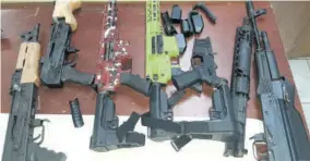  ??  ?? Some of the weapons seized by the police in Montego Bay, St James on Monday