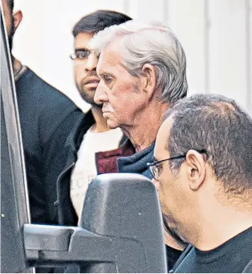  ?? ?? Above, David Hunter is escorted to a custody van at a court in Paphos after his hearing was adjourned. Left, Mr Hunter with his late wife, Janice. Below, Mr Hunter’s daughter, Lesley