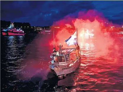  ?? ?? French trawlers block the harbour mouth at Saintmalo during yesterday’s protests at three Channel ports including Calais, below, and the Channel Tunnel over post-brexit fishing rights