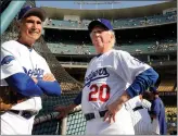  ?? Los Angeles Times/tns ?? Former Dodger pitchers Sandy Koufax, left, and Don Sutton chat before an old-timers game at Dodger Stadium Saturday, June 8, 2013 in Los Angeles.