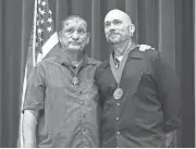  ?? ROB SCHUMACHER/THE REPUBLIC ?? Arizona Department of Public Safety Trooper Ed Andersson (left) and Thomas Yoxall are honored during a ceremony.