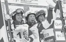  ?? JACQUES BOISSINOT / THE CANADIAN PRESS FILES ?? Andi Naude, left, is savouring her chance to ski for Canada at the 2018 Winter Games in PyeongChan­g, South Korea.