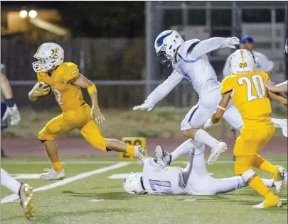  ?? Chris Kaufman/appeal-democrat ?? Yuba City High’s Erik Palmquist runs for a touchdown during a game against Pleasant Valley at Honker Stadium in fall, 2019 in Yuba City.