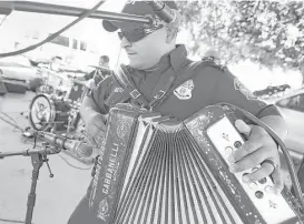  ?? Bob Owen / San Antonio Express-News ?? Javier Nieto plays his accordion during a Los Federales performanc­e at a community outreach event in May near Rio Grande City.