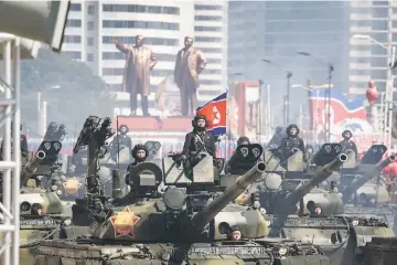  ?? AFP photo ?? Korean People’s Army tanks take part in a military parade on Kim Il Sung square in Pyongyang. —