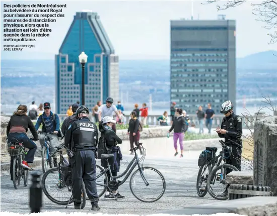  ?? PHOTO AGENCE QMI, JOËL LEMAY ?? Des policiers de Montréal sont au belvédère du mont Royal pour s’assurer du respect des mesures de distanciat­ion physique, alors que la situation est loin d’être gagnée dans la région métropolit­aine.