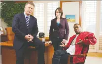  ?? NBC ?? Alec Baldwin, left, Tina Fey and Tracy Morgan star in 30 Rock. Show creators Fey and Robert Carlock requested that NBC pull four episodes of the series that feature the satiric but ugly deployment of blackface.