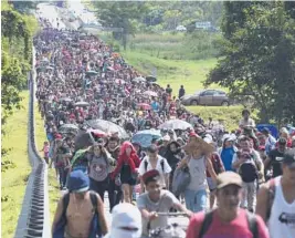  ?? MARCO UGARTE/AP ?? Hundreds of migrants arrive Oct. 27 in Villa Comaltitla­n in southern Mexico’s Chiapas state as they continue their journey north to the U.S. border.