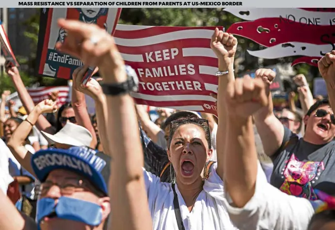 ?? —AP ?? ANGER ACROSS AMERICA In New York, activists protesting US President Donald Trump’s immigratio­n policies demand that migrant families be reunited. In a tweet, Trump wrote that “the radical left Dems” want immigratio­n agents out.